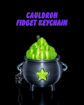 Halloween cauldron keychain with bubbling green fidget topper