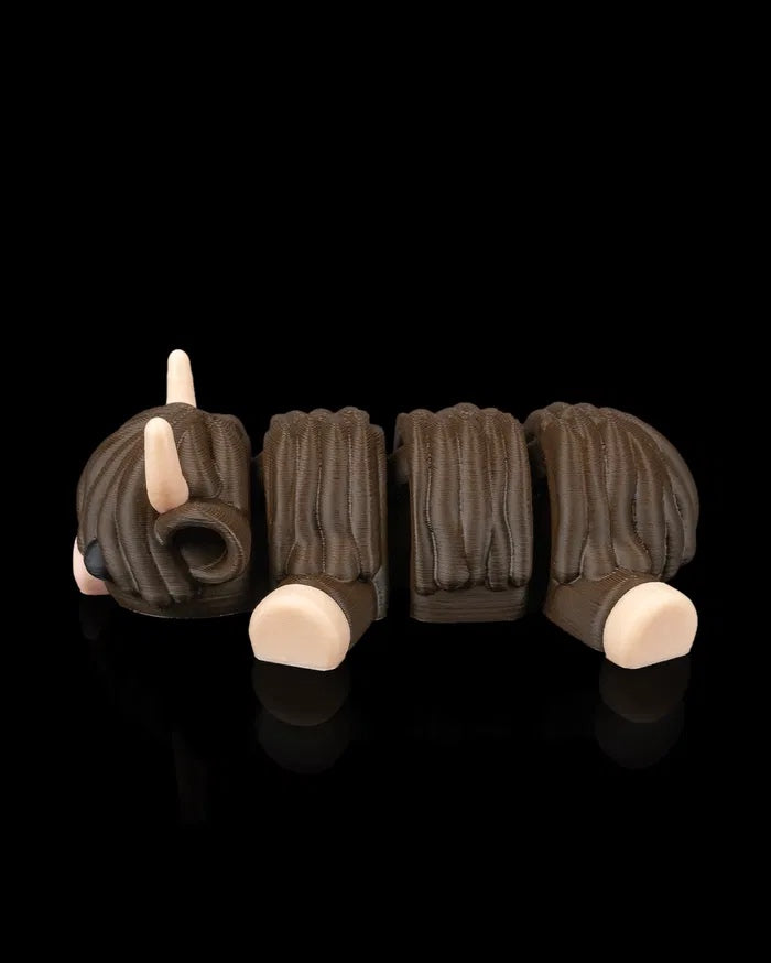 Highland Cow in Field Nest