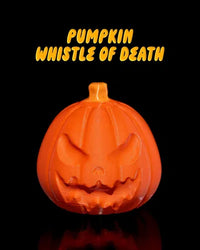 Angry-faced pumpkin fidget whistle in bright orange