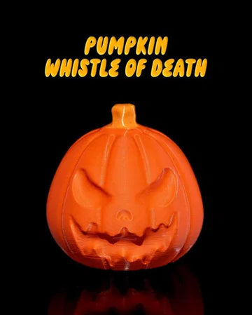 Angry-faced pumpkin fidget whistle in bright orange
