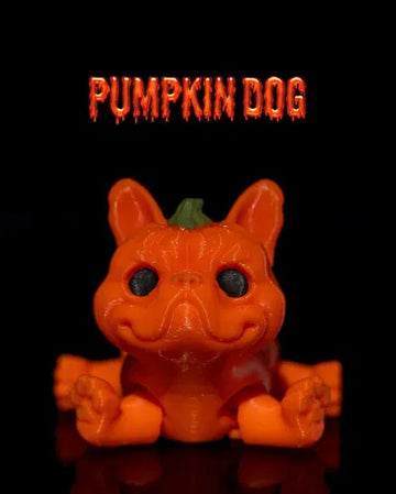 Bright orange dog figurine with jack-o-lantern features and green stem on head